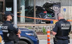 Car Crashes Onto RCMP Headquarters Entrance - Montreal
