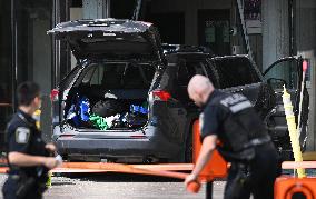 Car Crashes Onto RCMP Headquarters Entrance - Montreal