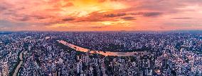 Urban Landscape Reflected by Brilliant Sunset Clouds in Nanning