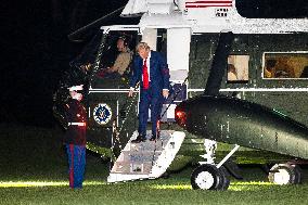 US President Trump returns to DC from Bedminster