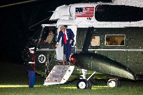 US President Trump returns to DC from Bedminster