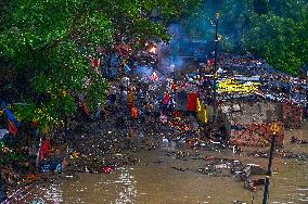 Flood Forces Cremations to Higher Ground