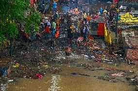 Flood Forces Cremations to Higher Ground