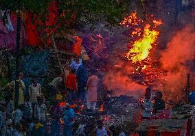 Flood Forces Cremations to Higher Ground