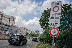 Illustration - Ring Road with ZFE Sign and Crit'Air Stickers - Paris