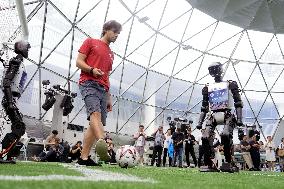Humanoid robots play football