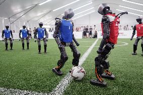 Humanoid robots play football
