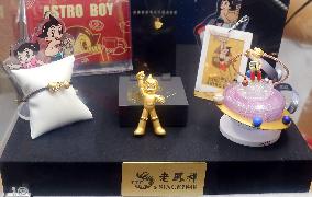 LaoFengXiang Gold Figurine Model at 2025 ChinaJoy