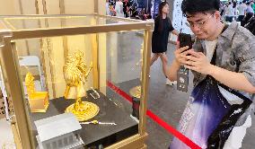 LaoFengXiang Gold Figurine Model at 2025 ChinaJoy