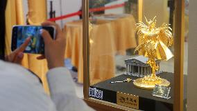 LaoFengXiang Gold Figurine Model at 2025 ChinaJoy