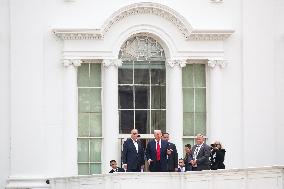 DC: President Trump walks on roof of the West Wing of the White House