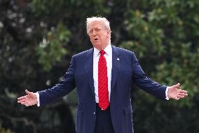 DC: President Trump walks on roof of the West Wing of the White House