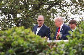 DC: President Trump walks on roof of the West Wing of the White House