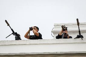 DC: President Trump walks on roof of the West Wing of the White House