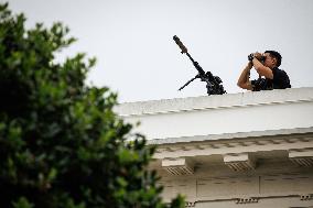 DC: President Trump walks on roof of the West Wing of the White House