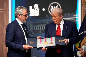Donald Trump signs the Olympic Executive Order - Washington