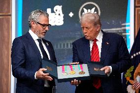 Donald Trump signs the Olympic Executive Order - Washington