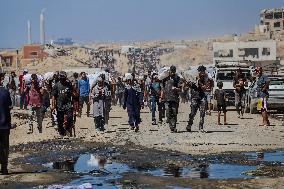 Gazans Flock to Aid Distribution Point - Gaza