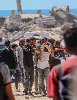 Gazans Flock to Aid Distribution Point - Gaza