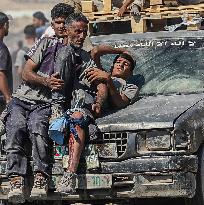 Gazans Flock to Aid Distribution Point - Gaza