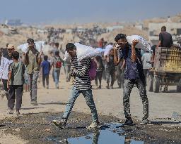 Gazans Flock to Aid Distribution Point - Gaza