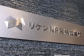 Riken NPR signboard and logo