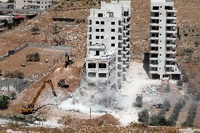 Israeli Excavators Demolish a Building - West Bank