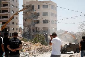 Israeli Excavators Demolish a Building - West Bank