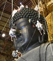 Annual cleaning of Great Buddha in Nara