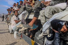 Palestinians Gather To Receive Limited Aid Amid Blockade - Palestine