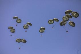Humanitarian Aid is Airdropped over the Gaza City - Palestine