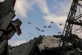 Humanitarian Aid is Airdropped over the Gaza City - Palestine