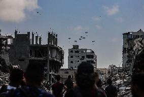 Humanitarian Aid is Airdropped over the Gaza City - Palestine