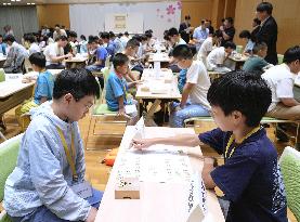 Children attend shogi event in Beijing