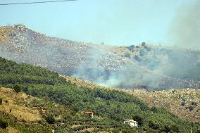 Fire Response in Santa Cristina Gela Helicopters Deployed - Italy
