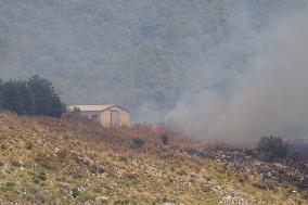 Fire Response in Santa Cristina Gela Helicopters Deployed - Italy