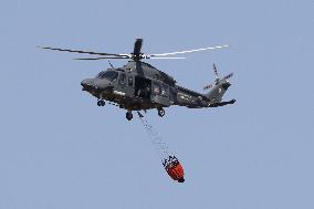 Fire Response in Santa Cristina Gela Helicopters Deployed - Italy