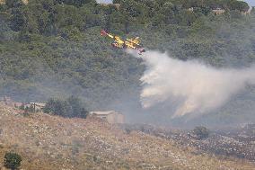 Fire Response in Santa Cristina Gela Helicopters Deployed - Italy