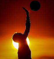 Illustration - Silhouetted at Sunset Amidst Vancouver Island Wildfires - Canada