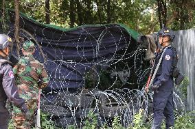 CAMBODIA-BANTEAY MEANCHEY-THAILAND-BORDER-BARBED WIRE & TYRES