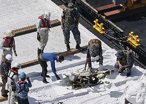 Part of crashed Japan defense force jet recovered