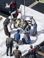 Part of crashed Japan defense force jet recovered