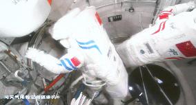 Astronaut Chen Dong Performing Extravehicular Activities