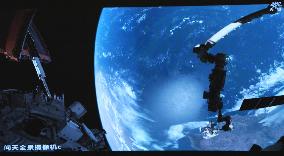 Astronaut Chen Dong Performing Extravehicular Activities