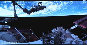 Astronaut Chen Dong Performing Extravehicular Activities