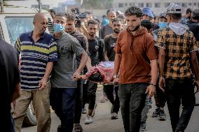 Families Mourn Airstrike Victims - Gaza