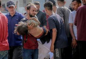 Families Mourn Airstrike Victims - Gaza