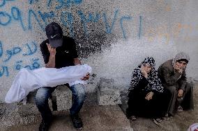 Families Mourn Airstrike Victims - Gaza