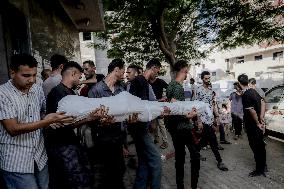 Families Mourn Airstrike Victims - Gaza