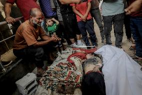 Families Mourn Airstrike Victims - Gaza